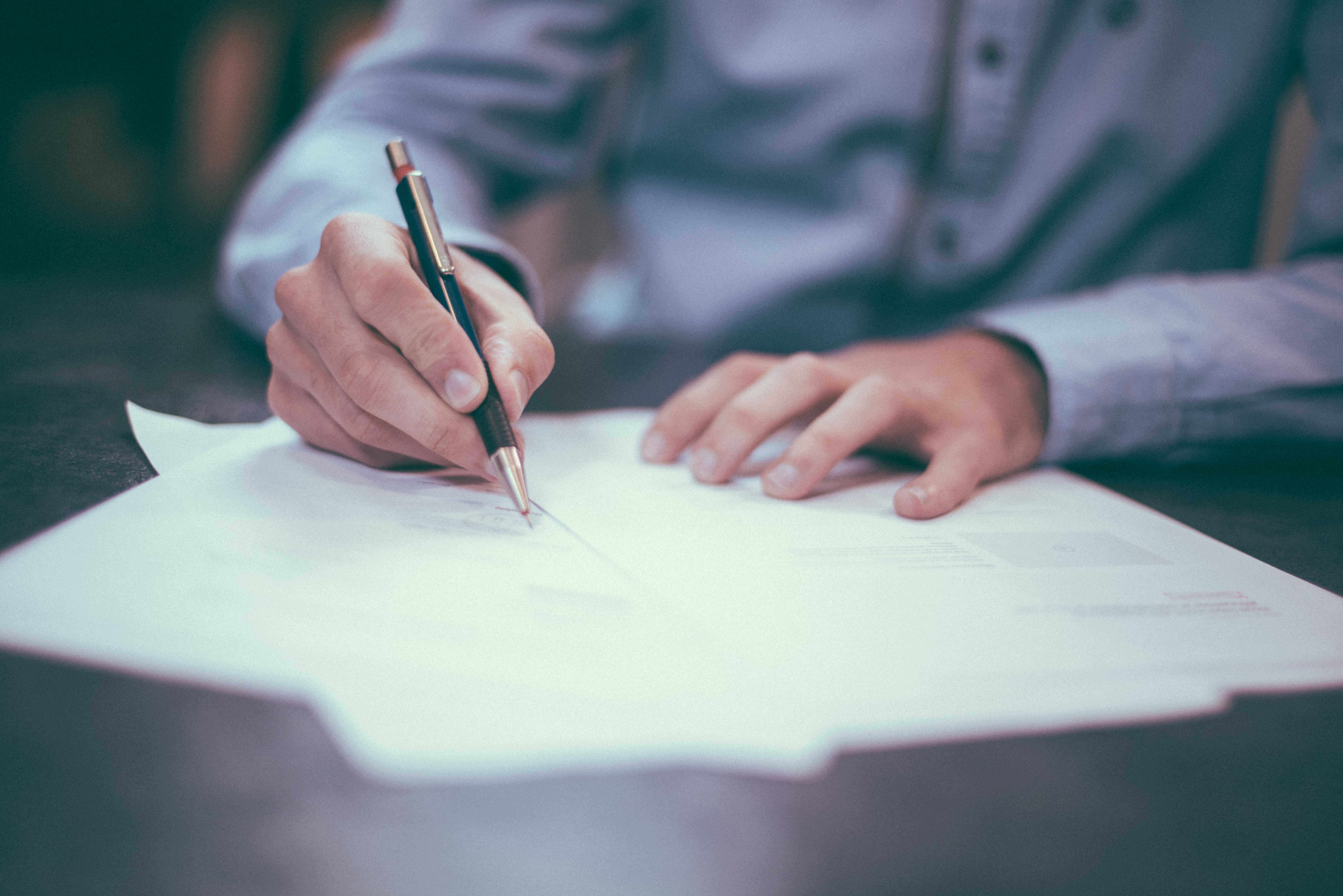 dog-care-business-signing-papers