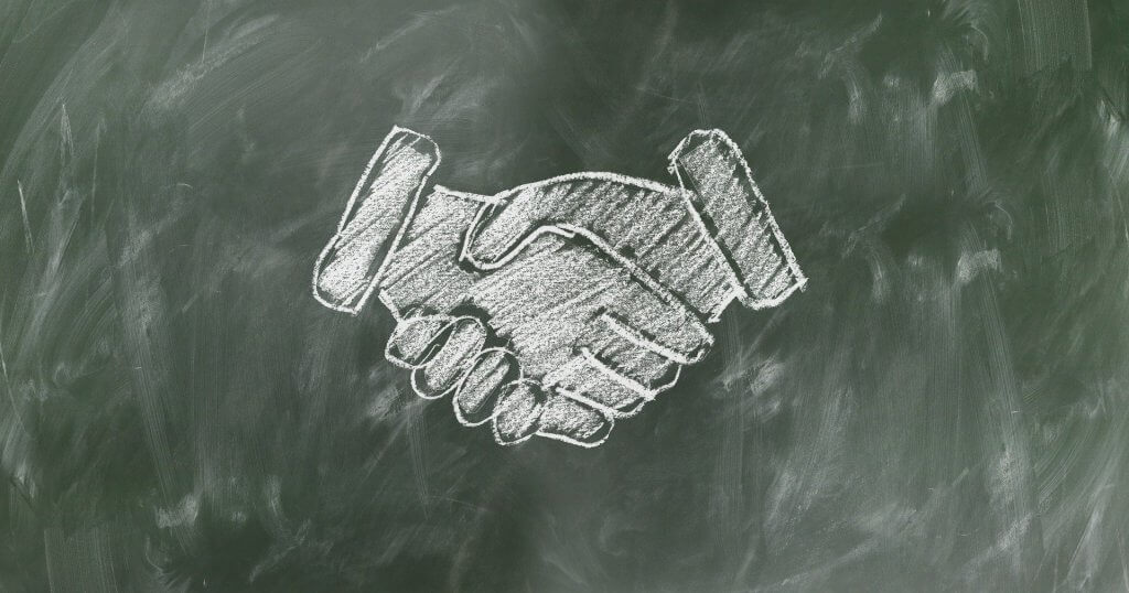 This image has an empty alt attribute; its file name is shaking-hands-teamwork-1024x538.jpg