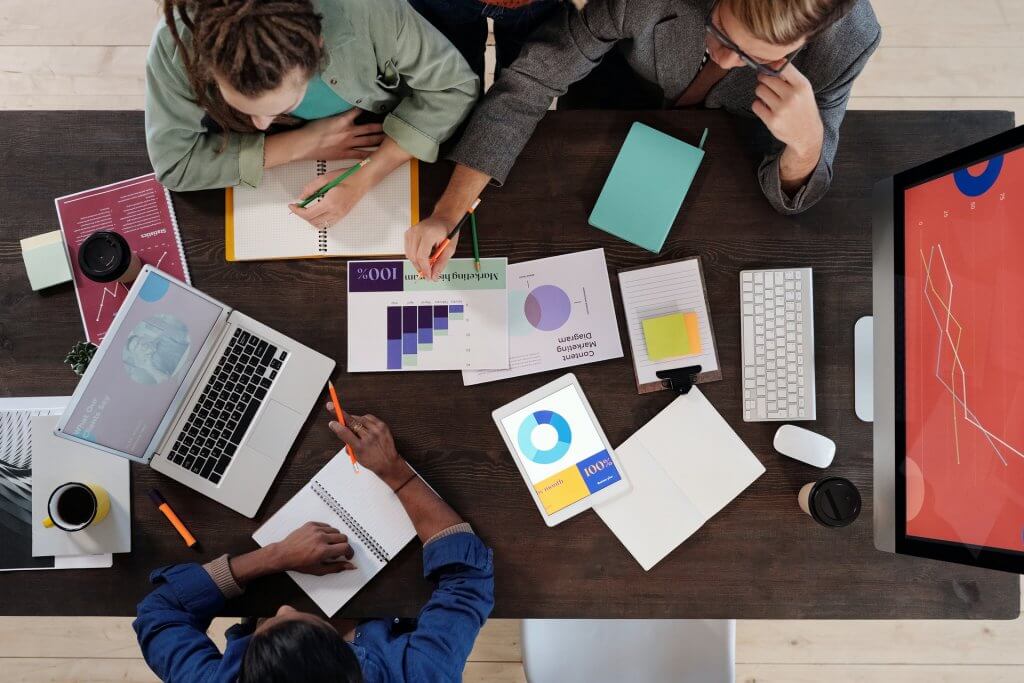 A team of small and middle-sized enterprise working on a business plan.