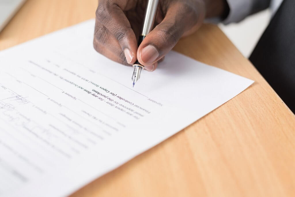 signing the agreement.